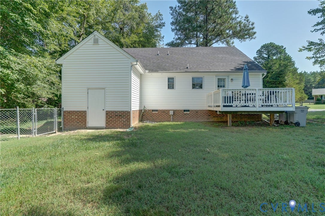4229 Greenbriar Drive, Chester, VA 23831 White siding exterior with brick foundation