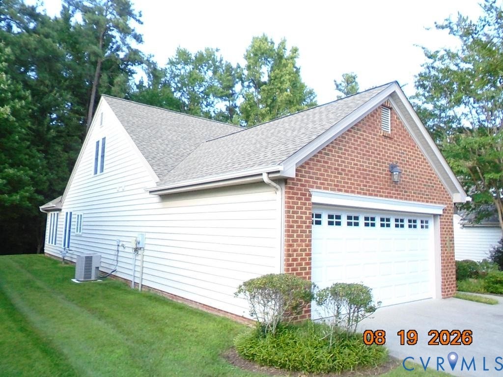 4113 Coles Point Way, Glen Allen, VA 23060 Brick and siding exterior with an attached two-car garage