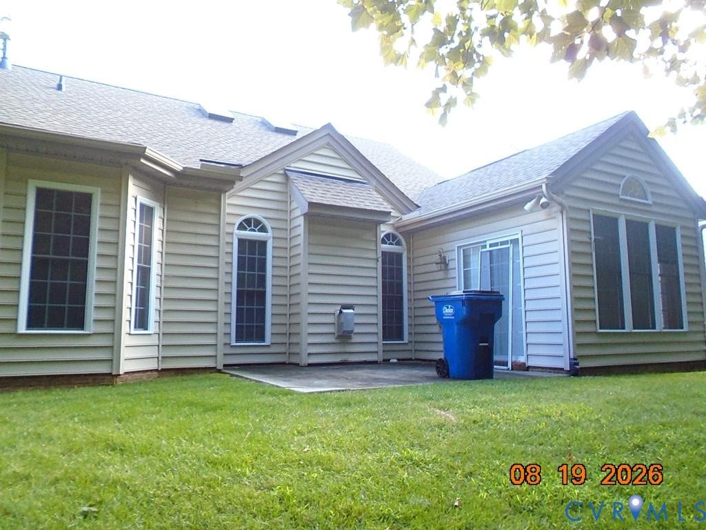 4113 Coles Point Way, Glen Allen, VA 23060 Exterior with horizontal siding, a patio area, multiple windows, and a sliding glass door