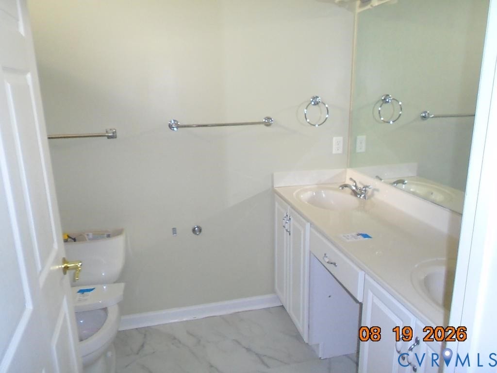 4113 Coles Point Way, Glen Allen, VA 23060 Dual vanity with integrated sinks, full-width mirror, and chrome fixtures
