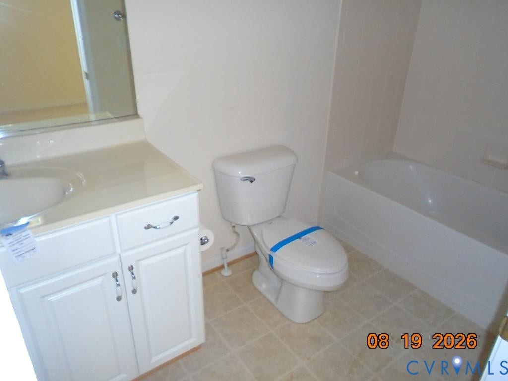 4113 Coles Point Way, Glen Allen, VA 23060 White vanity with an integrated sink and mirror