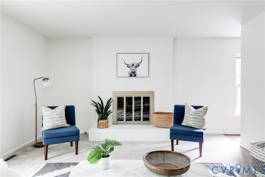 4116 Bronholly Road, Chesterfield, VA 23832 Painted brick fireplace with a light-toned hearth is a beautiful focal point.