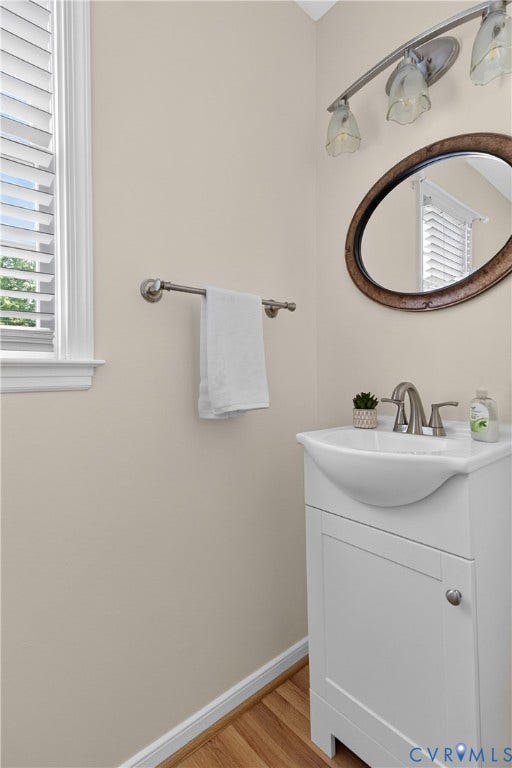 8330 Ferdinand Lane, Midlothian, VA 23112 Half Bath off the laundry room.