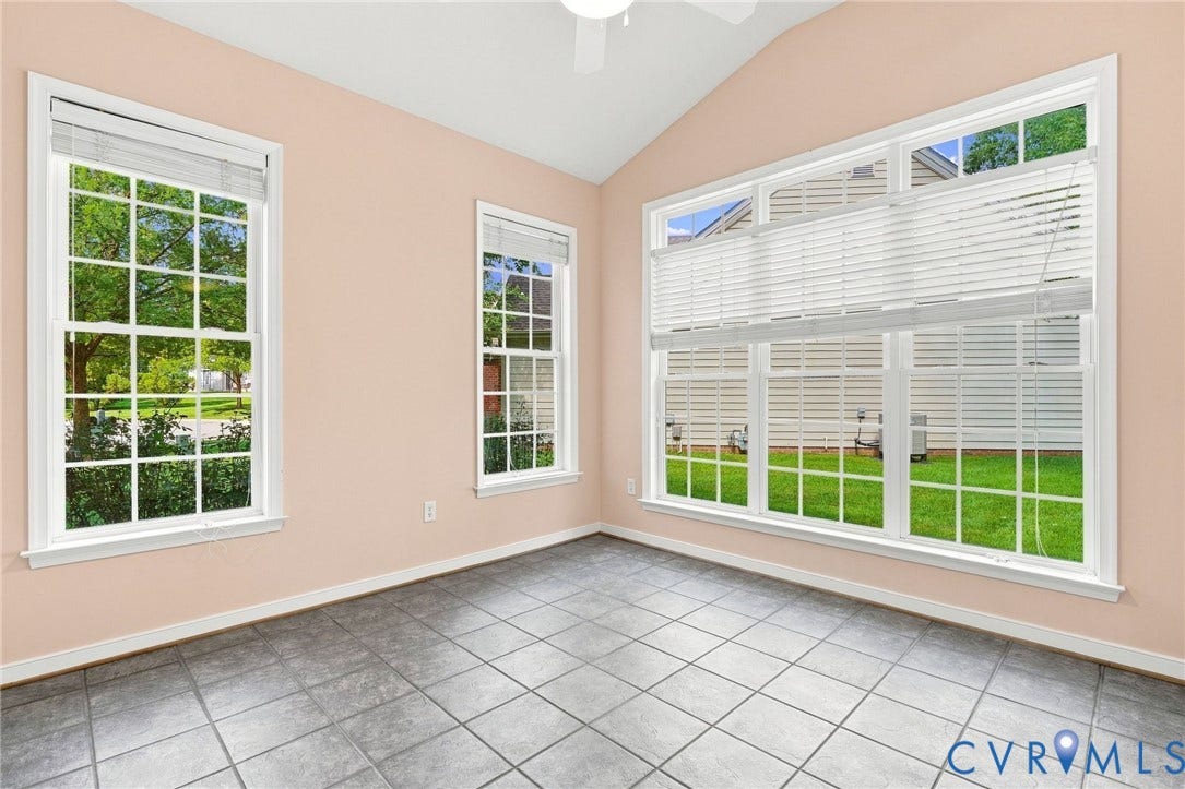Vaulted ceiling accentuates the room's height