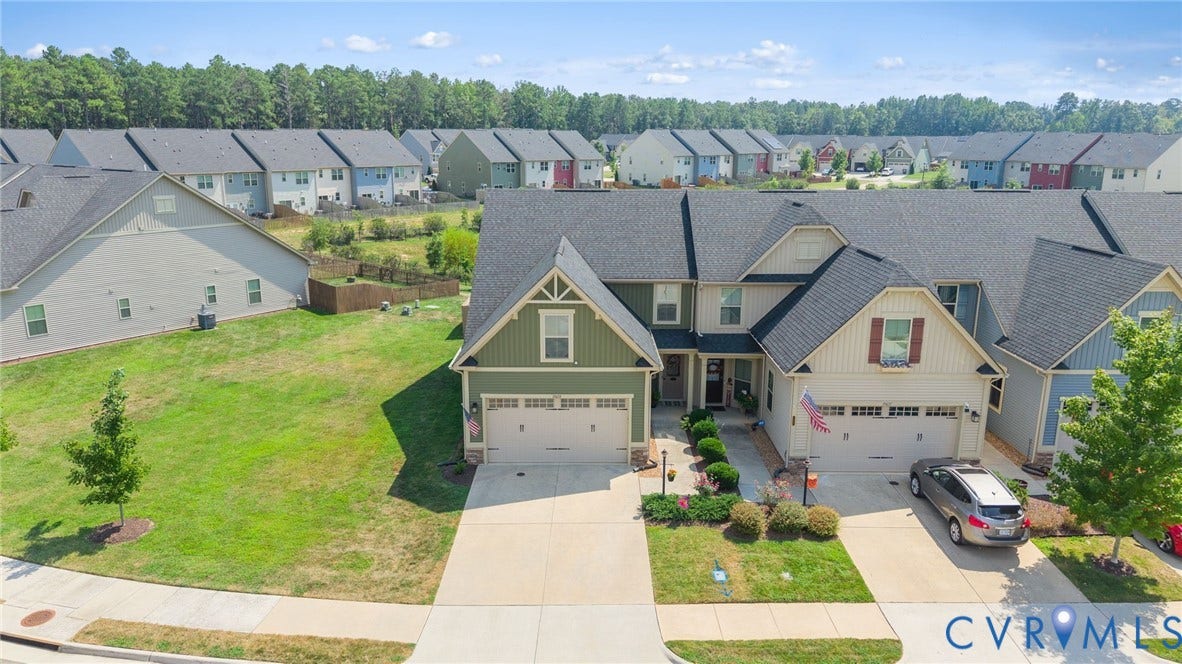 10633 Braden Parke Drive, Chesterfield, VA 23832 This end unit is situated with a spacious open yard between the next townhome offering better lighting and privacy.