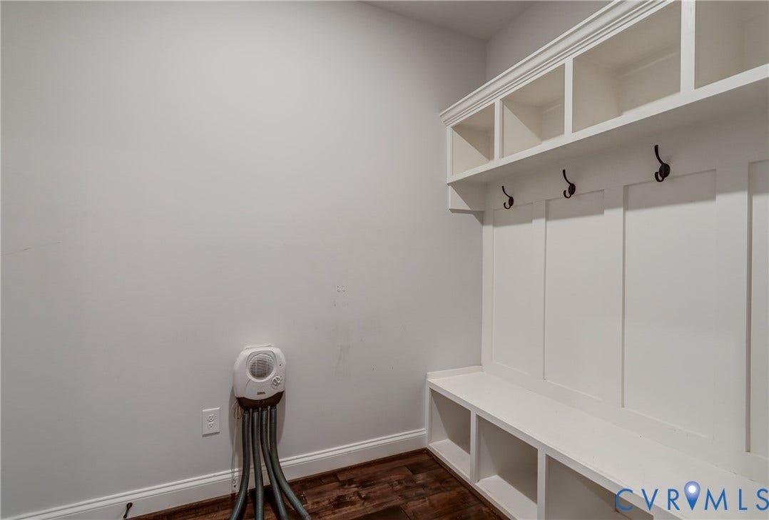 11515 Grey Oaks Estates Run, Grey Oaks Estates, Glen Allen, VA 23059 Built-in storage bench with overhead cubbies and coat hooks, complemented by wood-finish flooring