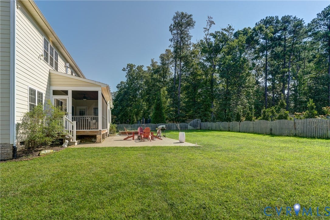 11515 Grey Oaks Estates Run, Grey Oaks Estates, Glen Allen, VA 23059 Expansive backyard featuring a large concrete patio, screened porch, and privacy fencing