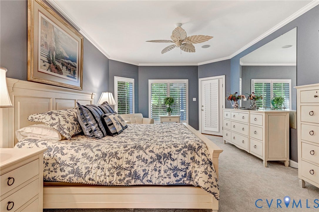 Recessed lighting, crown molding, ceiling fan, carpeted flooring, and white plantation shutters