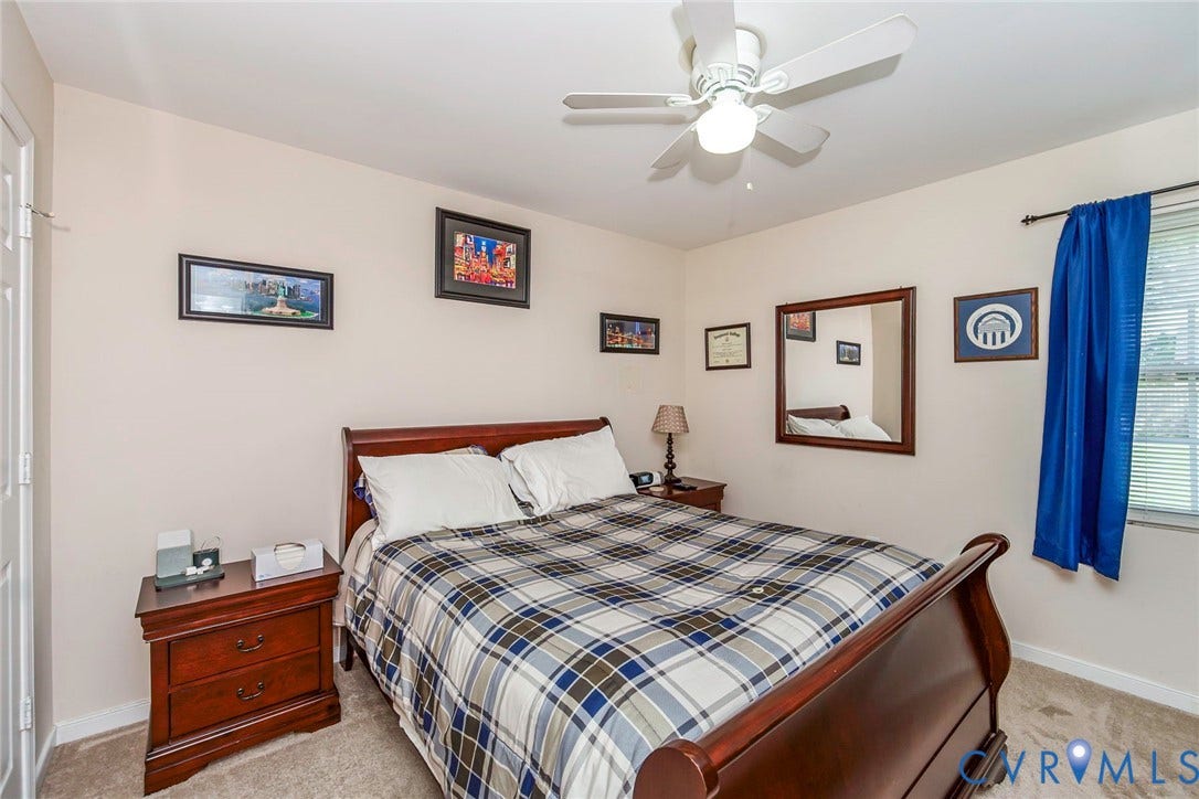 2765 Meadowbrook Street, Petersburg, VA 23803 Neutral wall color with plush carpeted flooring