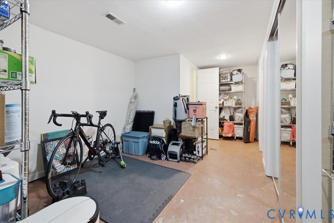 4702 New Kent Avenue, Westover Hills, Richmond, VA 23225 Finished concrete flooring, white walls, recessed lighting, and a white interior door