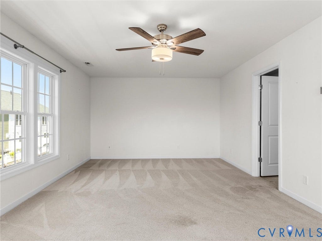14227 Michaux Village Drive, Winterfield Park, Midlothian, VA 23113 Recessed windows, neutral carpeting, ceiling fan with integrated lighting, and a white interior door