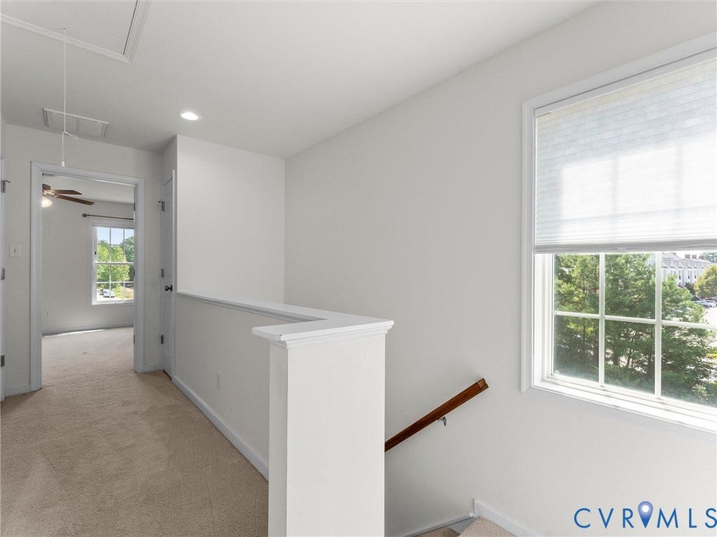 14227 Michaux Village Drive, Winterfield Park, Midlothian, VA 23113 Carpeted landing with white balustrade, recessed ceiling lighting, and a large window with privacy blinds