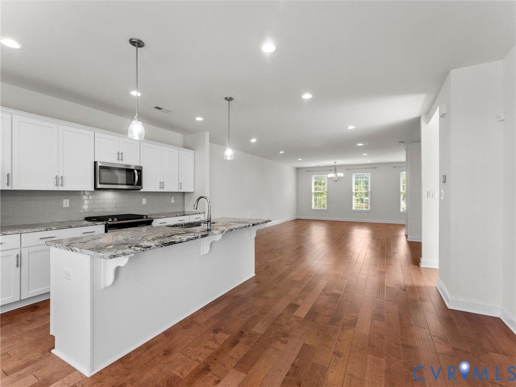 14227 Michaux Village Drive, Winterfield Park, Midlothian, VA 23113 Open-concept living space with wood-finish flooring