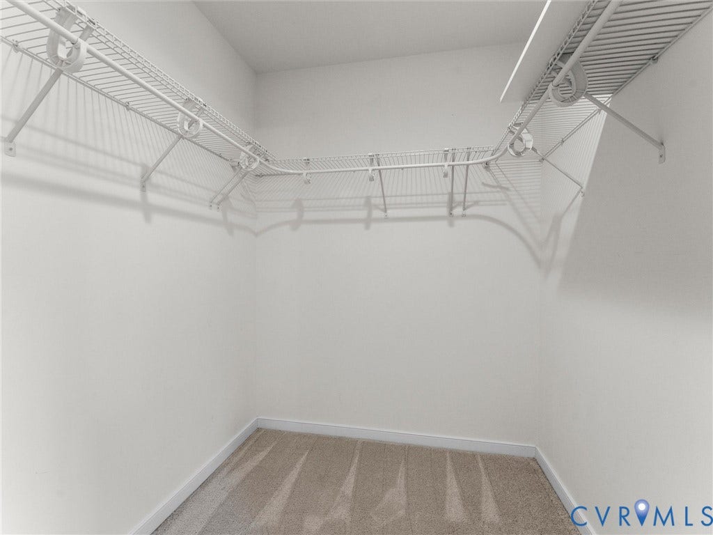 14227 Michaux Village Drive, Winterfield Park, Midlothian, VA 23113 Walk-in closet featuring wire shelving and hanging rods