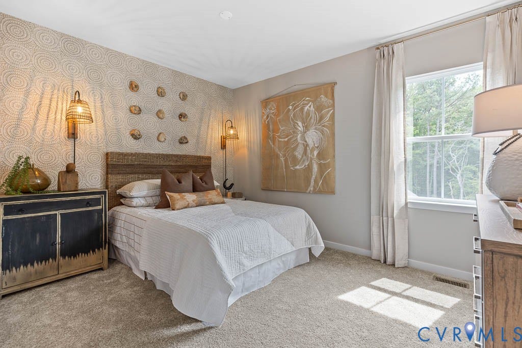 16074 Greenhart Drive, Chesterfield, VA 23832 Wall-to-wall carpeting, window with natural scenery, and built-in wall sconces