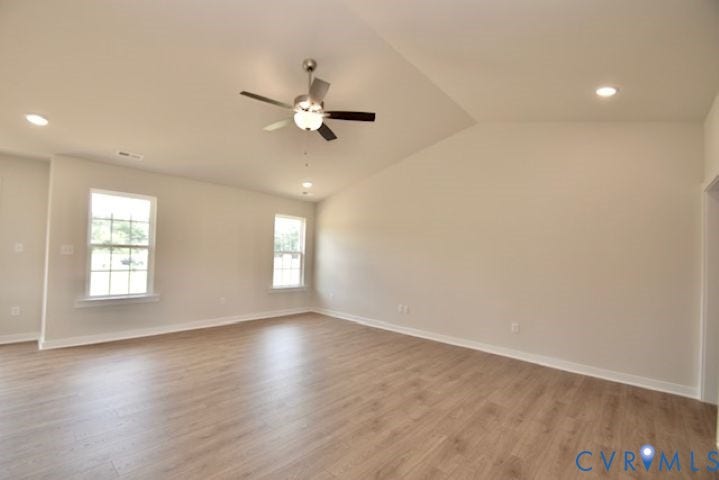410 Kents Mill Rd, Louisa, VA 23093 Vaulted ceiling with a ceiling fan, recessed lighting, wood-finish flooring, and multiple windows