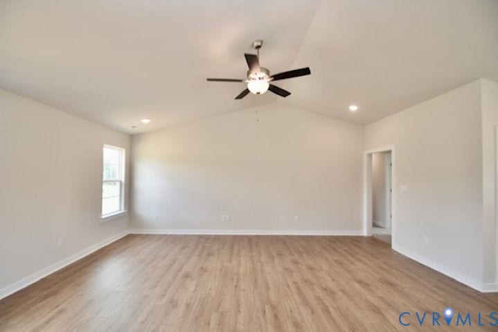 410 Kents Mill Rd, Louisa, VA 23093 Vaulted ceiling with a ceiling fan, recessed lighting, wood-finish flooring, and a window
