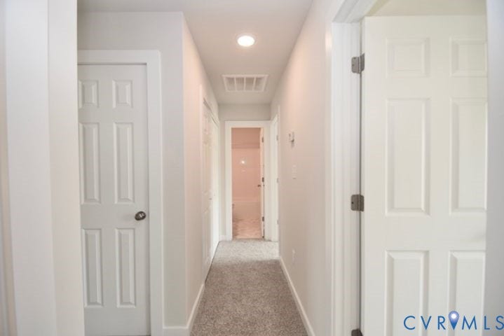 410 Kents Mill Rd, Louisa, VA 23093 Hallway with neutral carpeting and recessed lighting