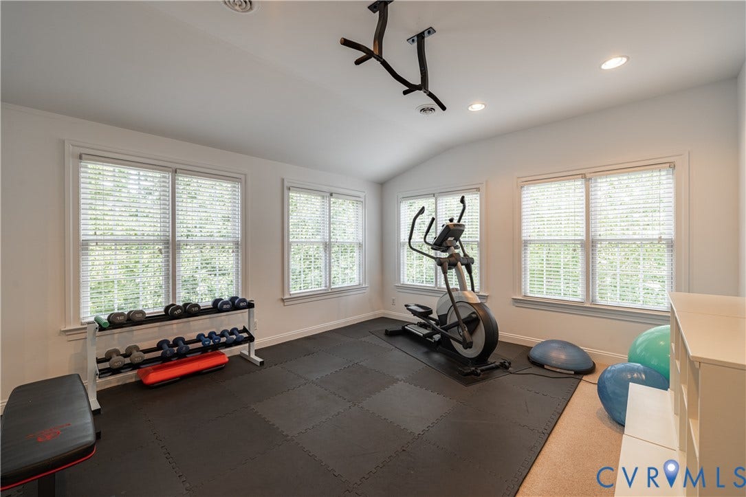 12917 Holmbank Lane, Henrico, VA 23233 Vaulted ceiling, recessed lighting, wall-mounted pull-up bar, and specialized rubber flooring