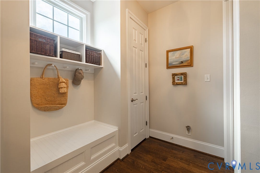 12917 Holmbank Lane, Henrico, VA 23233 Built-in bench with storage, upper shelving, and wall-mounted hooks