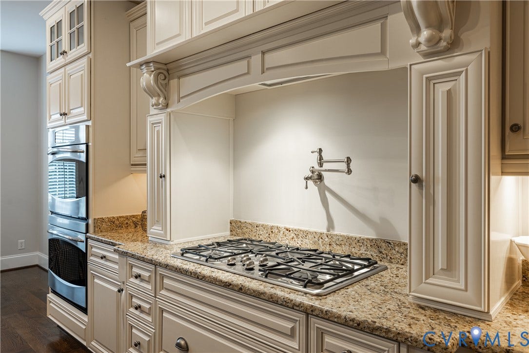 12917 Holmbank Lane, Henrico, VA 23233 Built-in stainless steel double ovens, gas range, wall-mounted pot filler