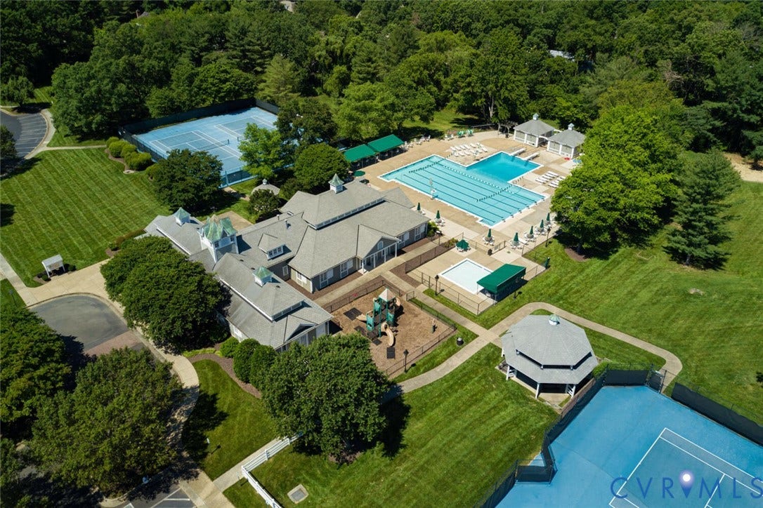 12917 Holmbank Lane, Henrico, VA 23233 Extensive outdoor amenities featuring multiple tennis courts, a large swimming pool, a separate wading pool, a shaded gazebo, and a children's play area