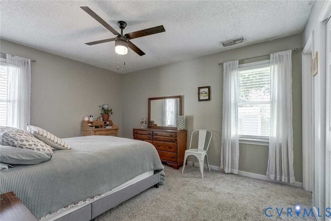 4647 Brookridge Road, Chesterfield, VA 23832 Plush carpet flooring, neutral painted walls, ceiling fan with integrated lighting, and multiple windows with blinds