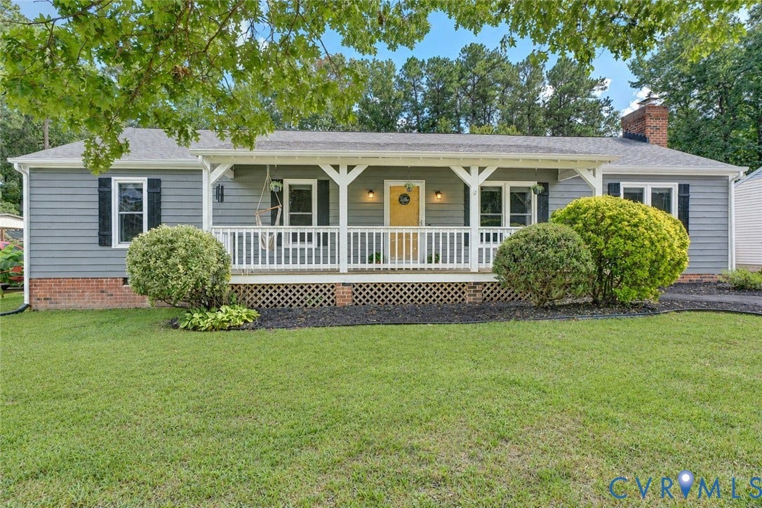 4647 Brookridge Road, Chesterfield, VA 23832 Ranch-style exterior with gray siding, a covered front porch featuring white railings, and a contrasting yellow entry door