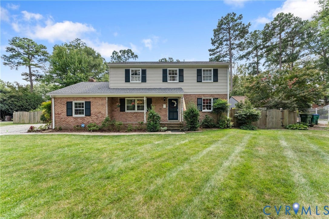 10205 Gwynnbrook Road, Richmond, VA 23235 Brick and siding exterior with dark shutters, established landscaping, and a well-maintained lawn