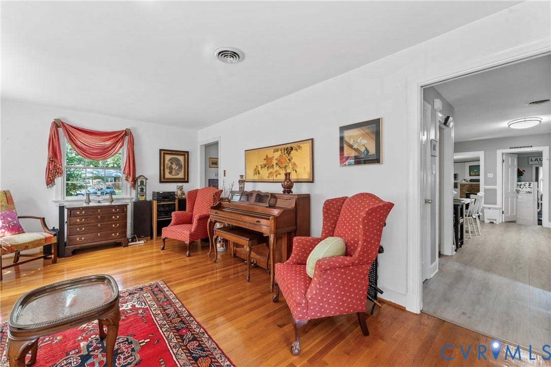10205 Gwynnbrook Road, Richmond, VA 23235 Hardwood flooring, painted white walls, recessed lighting, and a white window frame