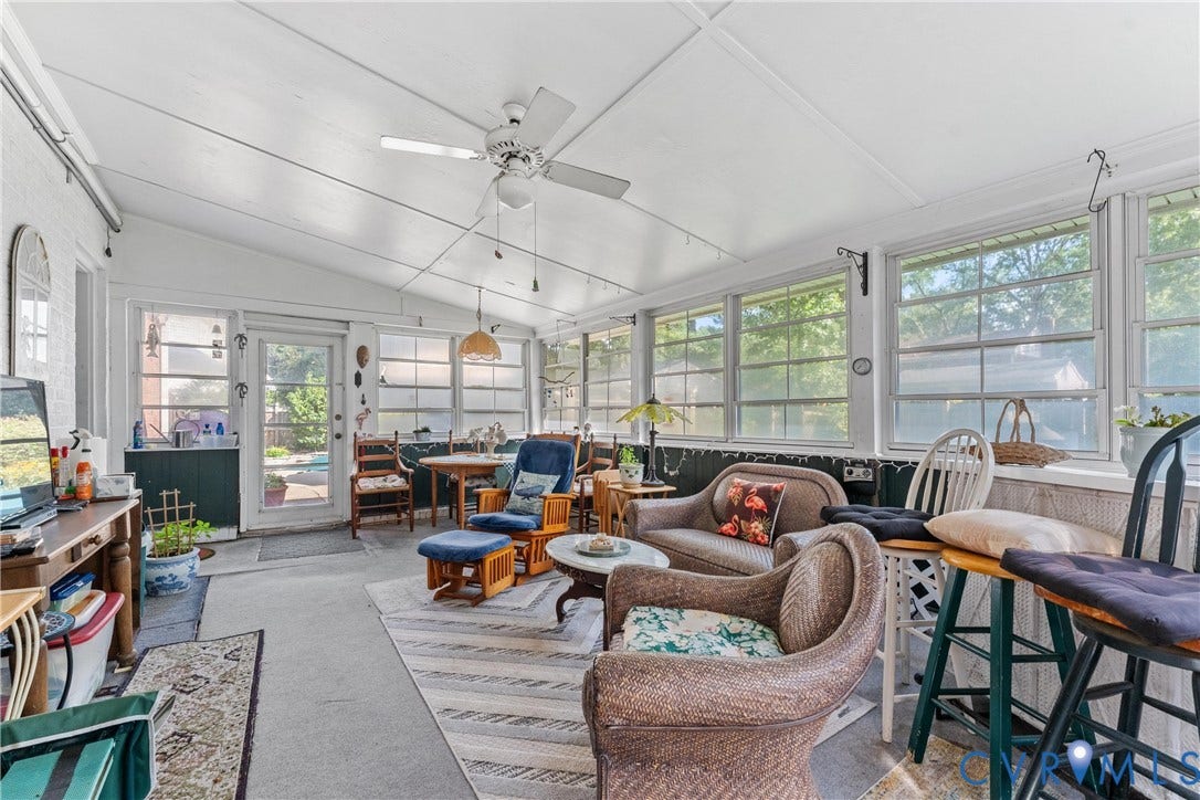 10205 Gwynnbrook Road, Richmond, VA 23235 Enclosed porch featuring multiple windows, a ceiling fan, and sloped ceiling