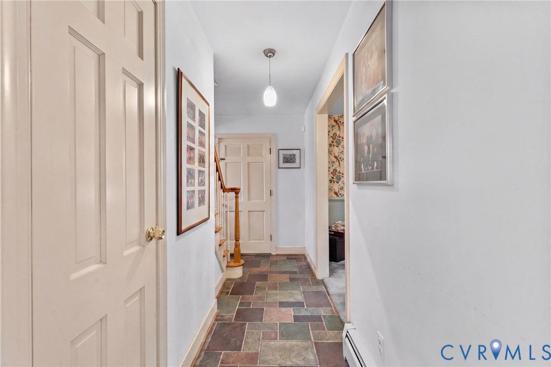 10205 Gwynnbrook Road, Richmond, VA 23235 Multi-tone slate tile flooring with light-colored walls and white trim