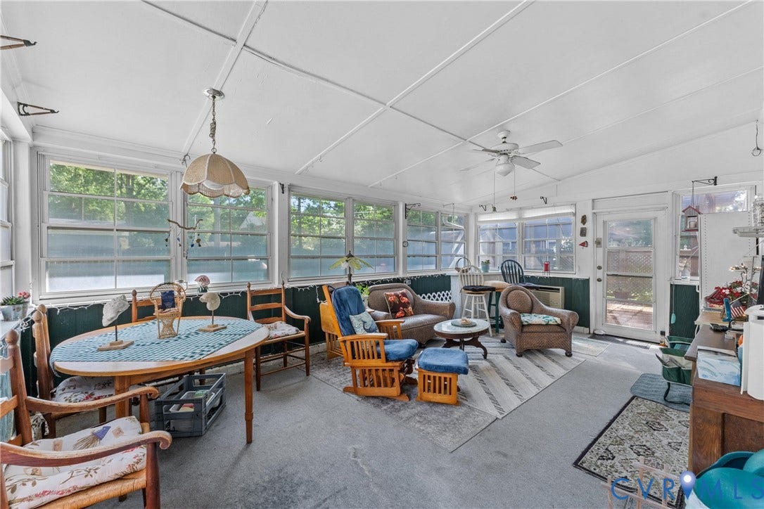 10205 Gwynnbrook Road, Richmond, VA 23235 Expansive sunroom featuring multiple large windows, a ceiling fan, and an exterior access door