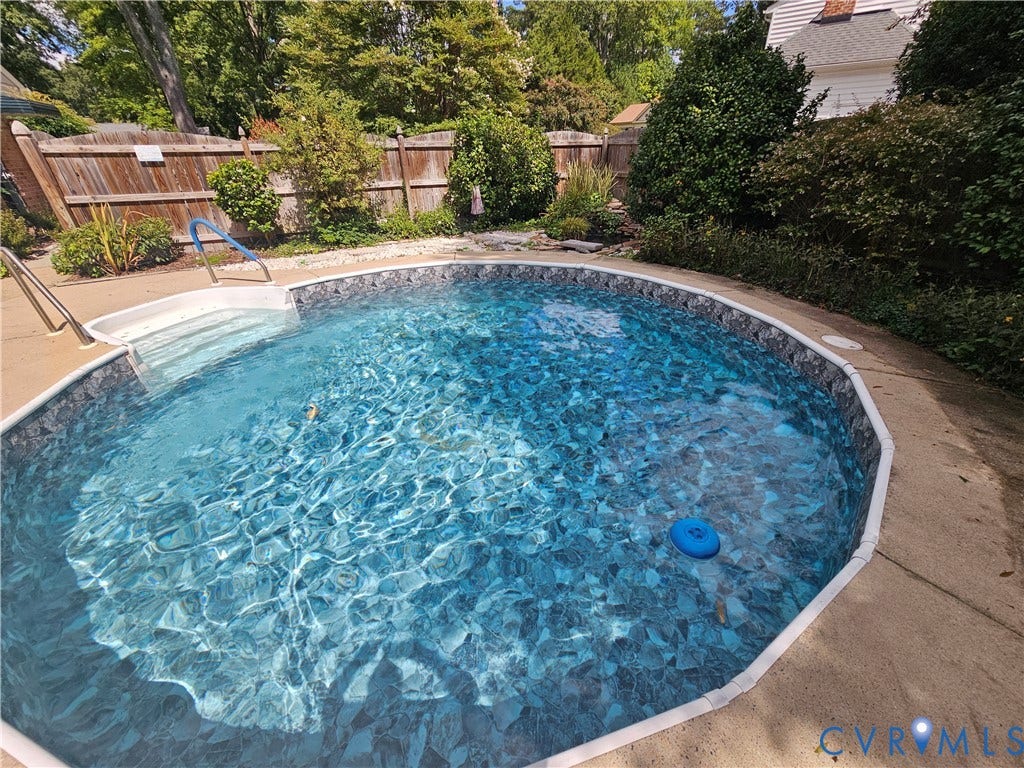 10205 Gwynnbrook Road, Richmond, VA 23235 In-ground pool featuring integrated steps and perimeter coping