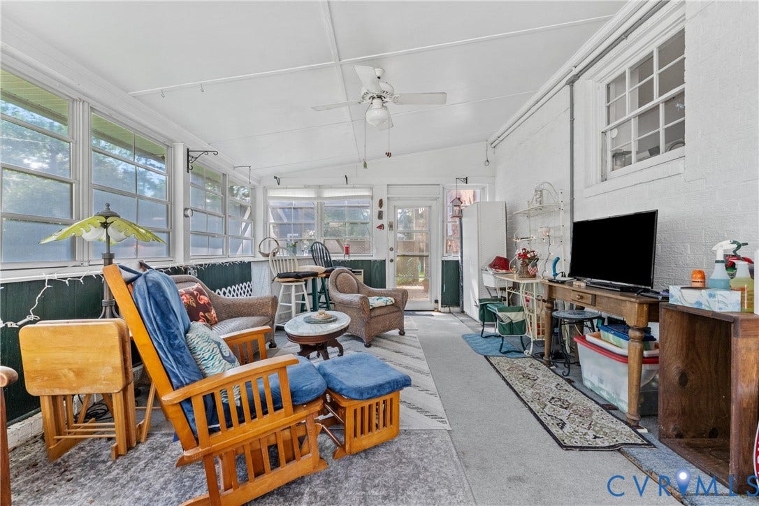 10205 Gwynnbrook Road, Richmond, VA 23235 Sunroom featuring numerous windows, a ceiling fan, and concrete flooring