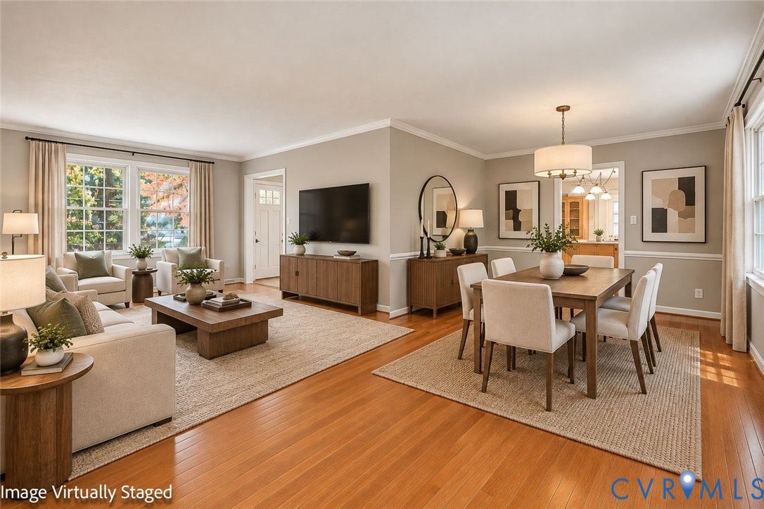 Open-concept area featuring wood-finish flooring, crown molding, chair rail trim, and a drum-style chandelier