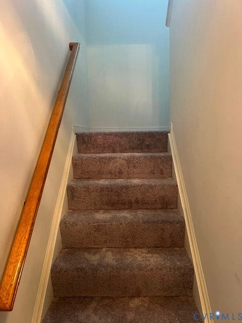 11419 Courthouse Acres Drive, Midlothian, VA 23114 Carpeted staircase featuring a wood handrail and light-toned walls