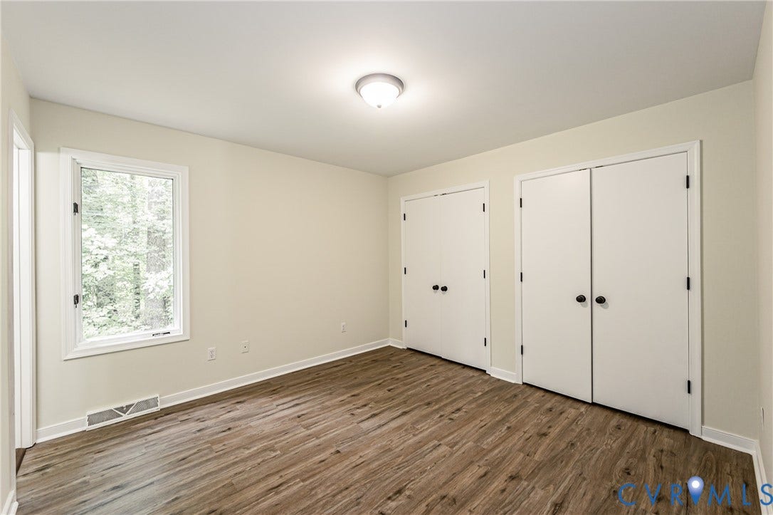 1520 Willow Brook Road, Louisa, VA 23024 LVP flooring, white walls, and a single window