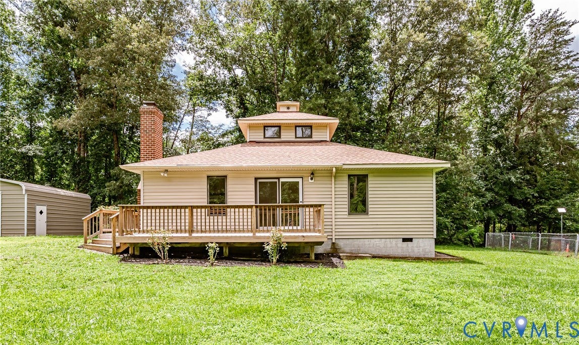 1520 Willow Brook Road, Louisa, VA 23024 Rear exterior featuring a wood deck, sliding glass doors, and light-colored siding