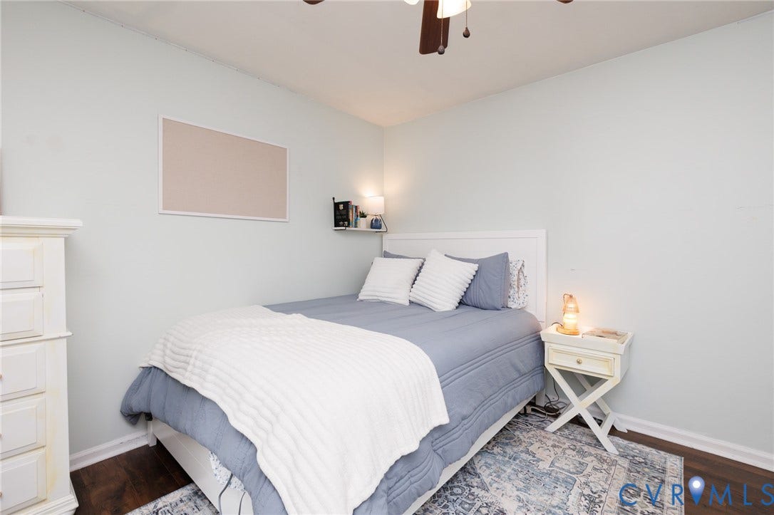 15525 Saddlebrook Road, Chesterfield, VA 23838 Light wall color with dark wood-finish flooring
