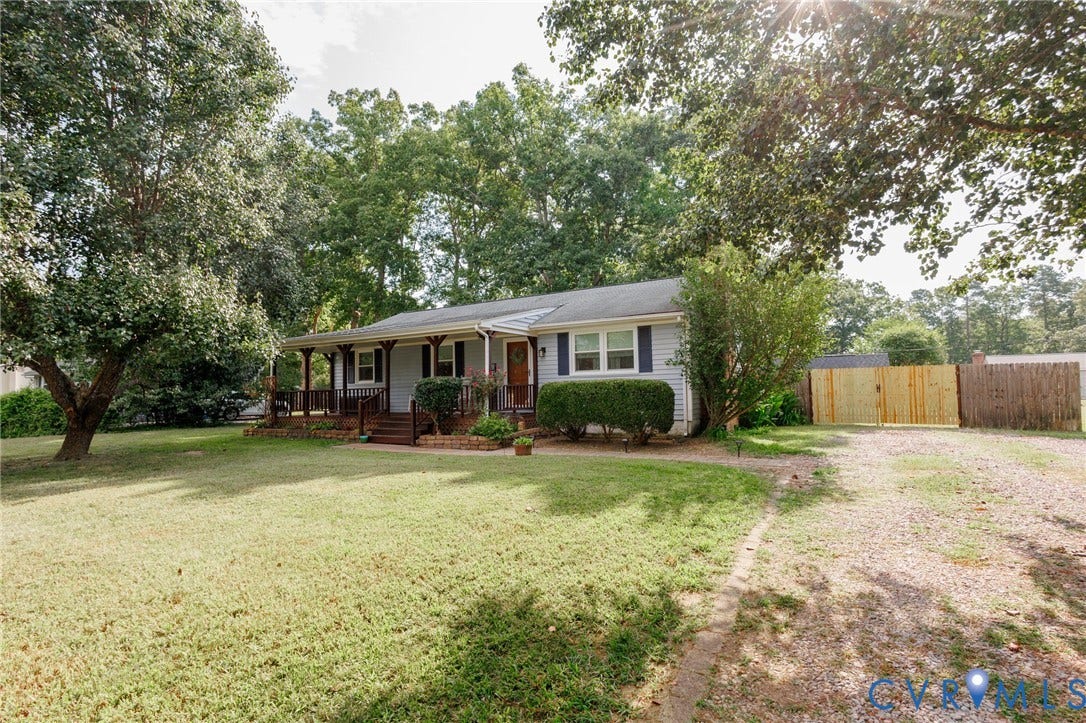 15525 Saddlebrook Road, Chesterfield, VA 23838 Ranch-style residence featuring a covered front porch with wooden railings, light-colored siding, and dark window shutters