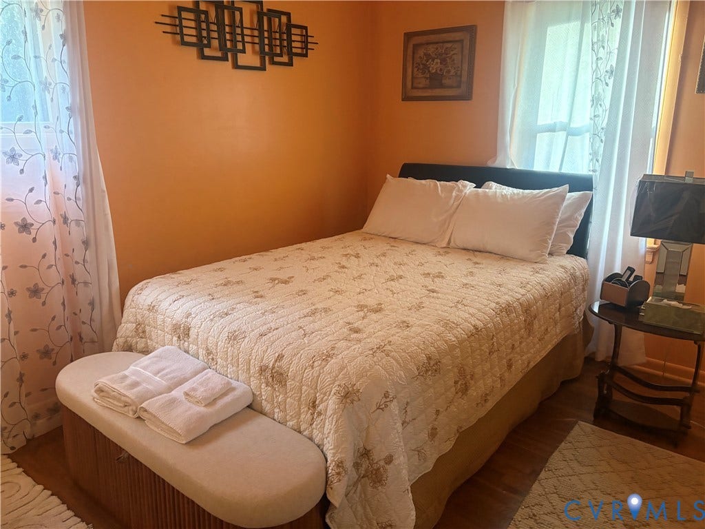 2443 Tignor Road, Richmond, VA 23224 Hardwood flooring, painted walls, and window treatments provide a complete interior aesthetic