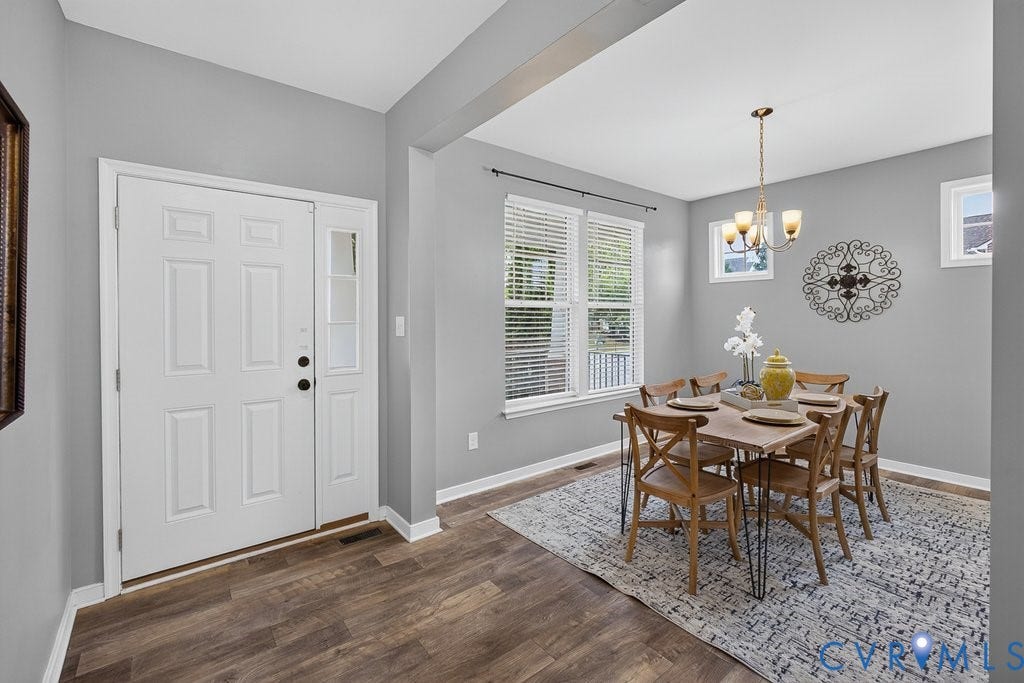 7401 Nicklaus Circle, Moseley, VA 23120 Or Potentially a Living Room. Wood-finish flooring throughout, bright entryway with a paneled entry door and a sidelight window