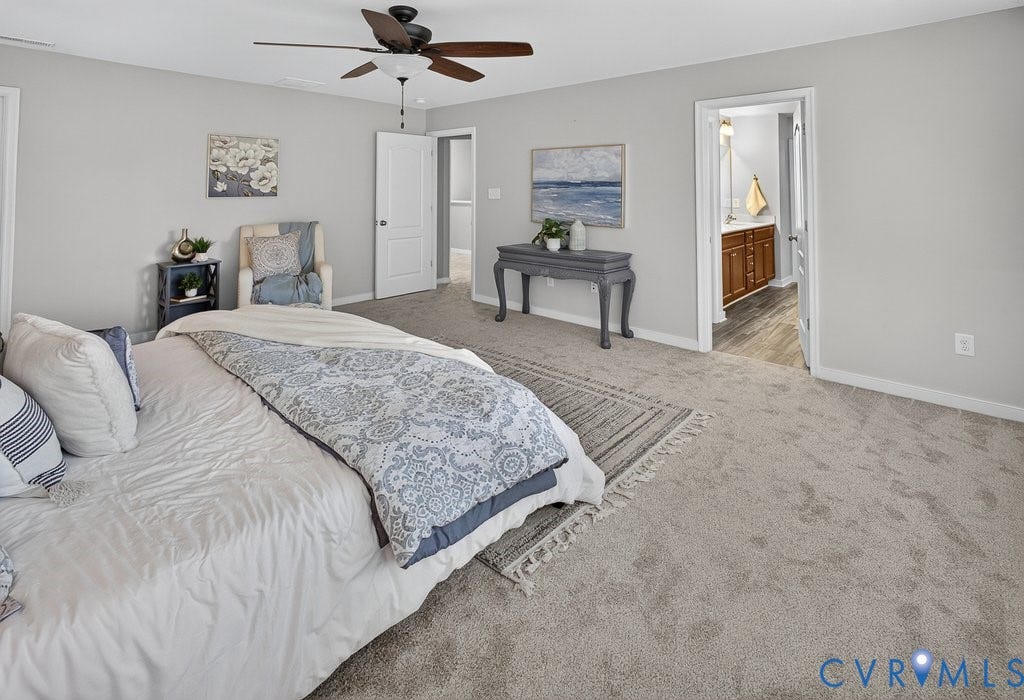 7401 Nicklaus Circle, Moseley, VA 23120 Spacious room with light gray walls and plush gray carpeting