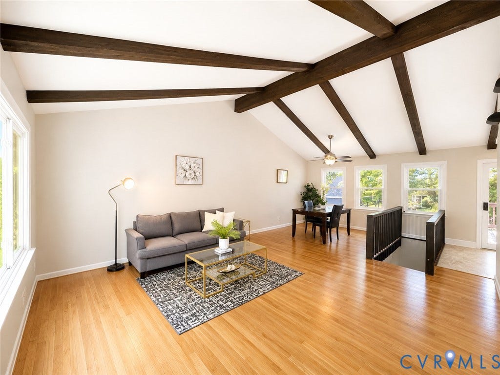 9018 Brucewood Drive, Midlothian, VA 23235 Vaulted ceiling with exposed wood beams, wood-finish flooring, multiple windows, and a ceiling fan