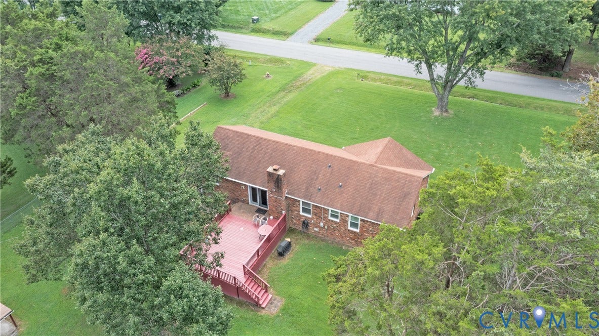 2730 Kinvan Road, Henrico, VA 23231 Brick exterior with a red-stained wood deck and a shingle roof