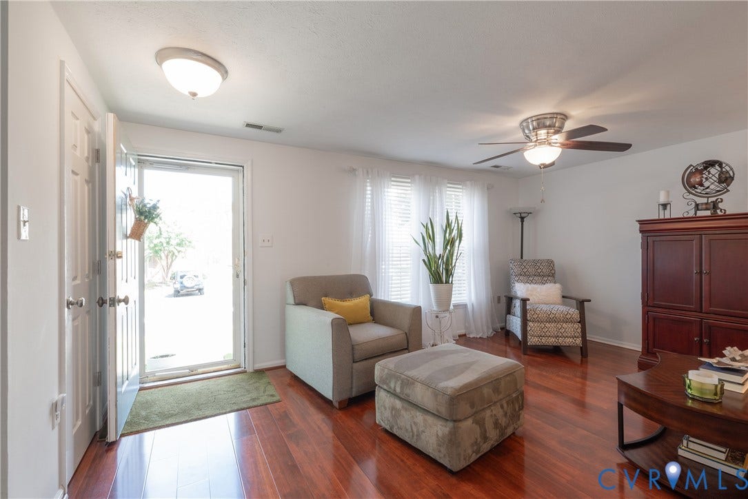 living Room with natural light and room for entertaining family and friends