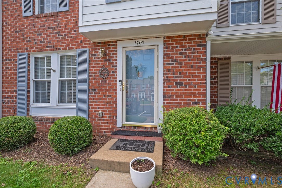 Entry with covered stoop.