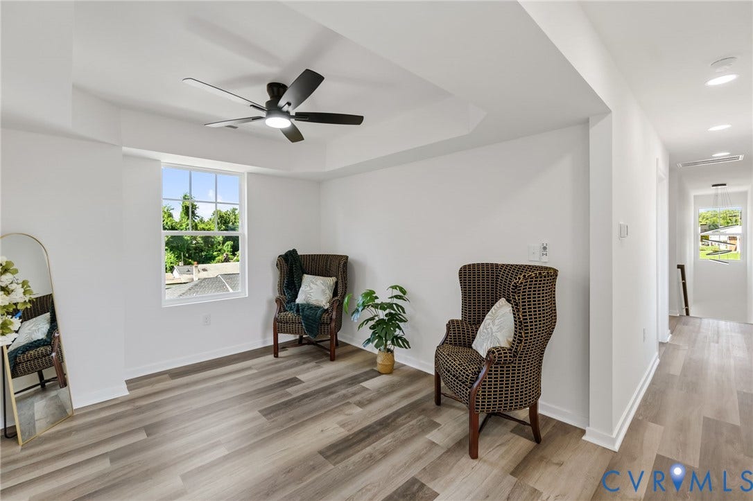 516 S South Street, Myers, Petersburg, VA 23803 Tray ceiling with a ceiling fan, window with grid panes, wood-finish flooring, and recessed lighting