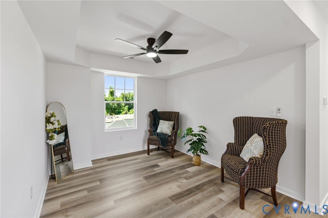 516 S South Street, Myers, Petersburg, VA 23803 Tray ceiling with recessed lighting and a ceiling fan